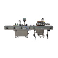 Automatic positioning labeling machine for round bottles